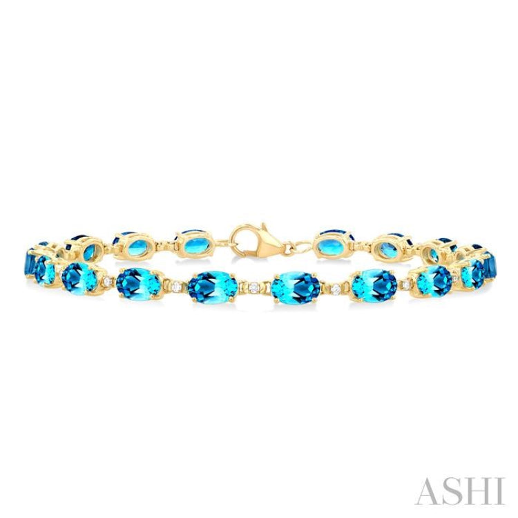 6X4 MM Oval Cut Blue Topaz and 1/6 ctw Round Cut Diamond Semi Precious Tennis Bracelet in 10K Yellow Gold