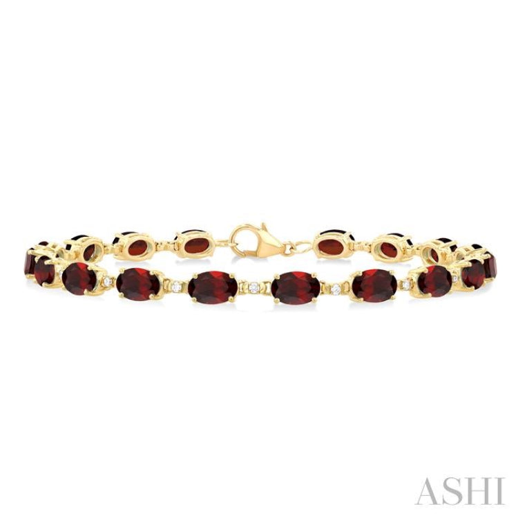 6X4 MM Oval Cut Garnet and 1/6 ctw Round Cut Diamond Semi Precious Tennis Bracelet in 10K Yellow Gold