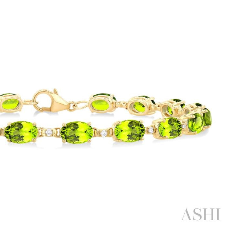 6X4 MM Oval Cut Peridot and 1/6 ctw Round Cut Diamond Semi Precious Tennis Bracelet in 10K Yellow Gold