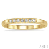1/10 ctw 7 Stone Round Cut Diamond Wedding Band in 14K Yellow Gold