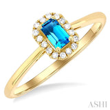 5x3 MM Octagonal Shape Blue Topaz and 1/20 ctw Single Cut Diamond Halo Semi Precious Ring in 14K Yellow Gold