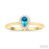 5x3 MM Pear Shape Blue Topaz and 1/20 ctw Single Cut Diamond Halo Semi Precious Ring in 14K Yellow Gold