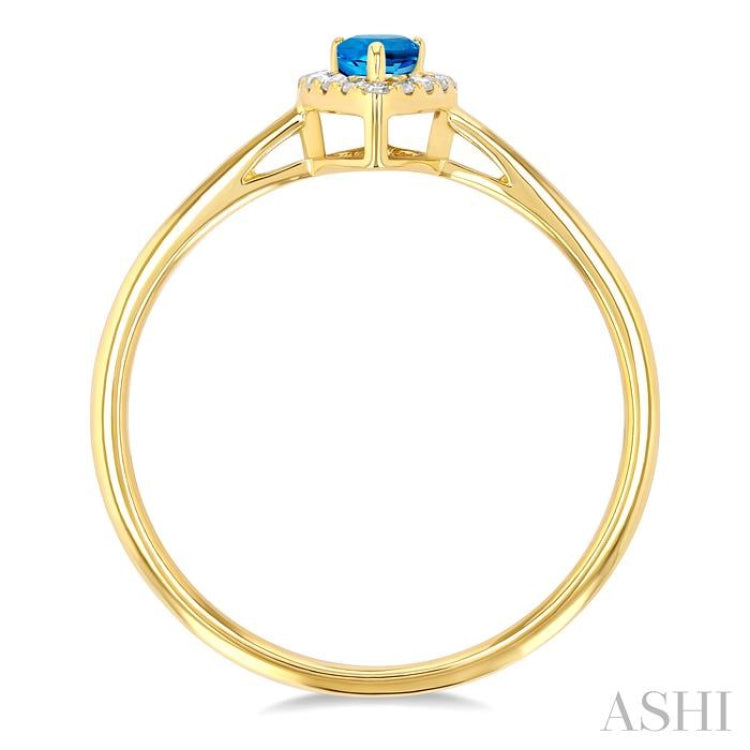 5x3 MM Pear Shape Blue Topaz and 1/20 ctw Single Cut Diamond Halo Semi Precious Ring in 14K Yellow Gold
