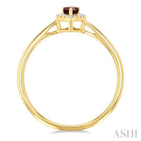 5x3 MM Pear Shape Garnet and 1/20 ctw Single Cut Diamond Halo Semi Precious Ring in 14K Yellow Gold