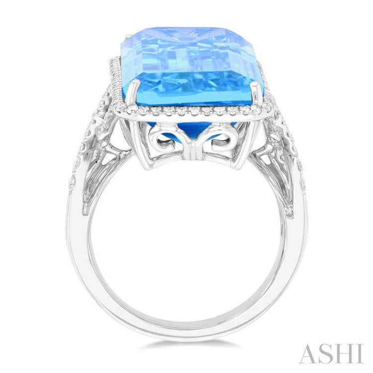26x12 MM Emerald Cut Blue Topaz and 1/2 ctw Round Cut Diamond Halo Semi Precious Ring in 14K White Gold