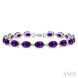 7X5 MM Oval Shape Amethyst and 1/10 Ctw Round Cut Diamond Semi-Precious Bracelet in Sterling Silver
