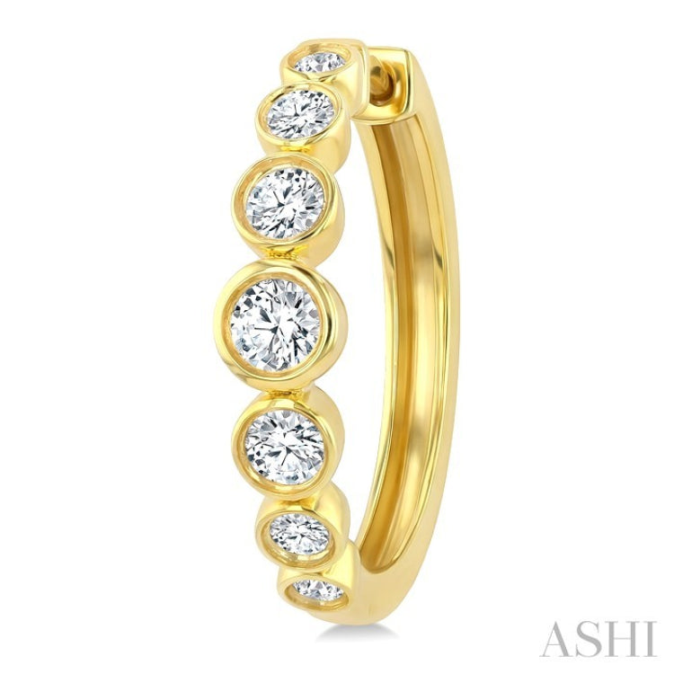 1 1/10 Ctw Graduated Bezel Set Round Cut Diamond Fashion Hoop Earrings in 14K Yellow Gold