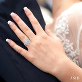 1 3/8 Ctw Lovebright Round Cut Diamond Wedding Set With 1 1/6 Ctw Cushion Shape Engagement Ring and 1/4 Ctw Scooped Wedding Band in 14K White Gold