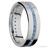 7 mm wide/Flat/14K White Gold band with an Eternity arrangement of 03 carat Round Denim Sapphire stones in a Channel setting