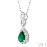 6x4 MM Pear Shape Emerald and 1/10 ctw Round Cut Diamond Pendant in 10K White Gold with Chain