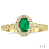 1/6 ctw Oval Shape 6x4mm Emerald & Round Cut Diamond Precious Ring in 10K Yellow Gold