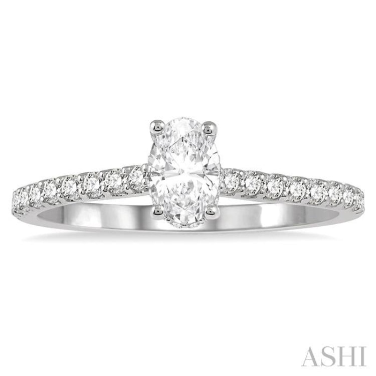 1/2 ctw Round Cut Diamond Engagement Ring With 1/4 ctw Oval Cut Center Stone in 14K White Gold