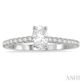 1/2 ctw Round Cut Diamond Engagement Ring With 1/4 ctw Oval Cut Center Stone in 14K White Gold