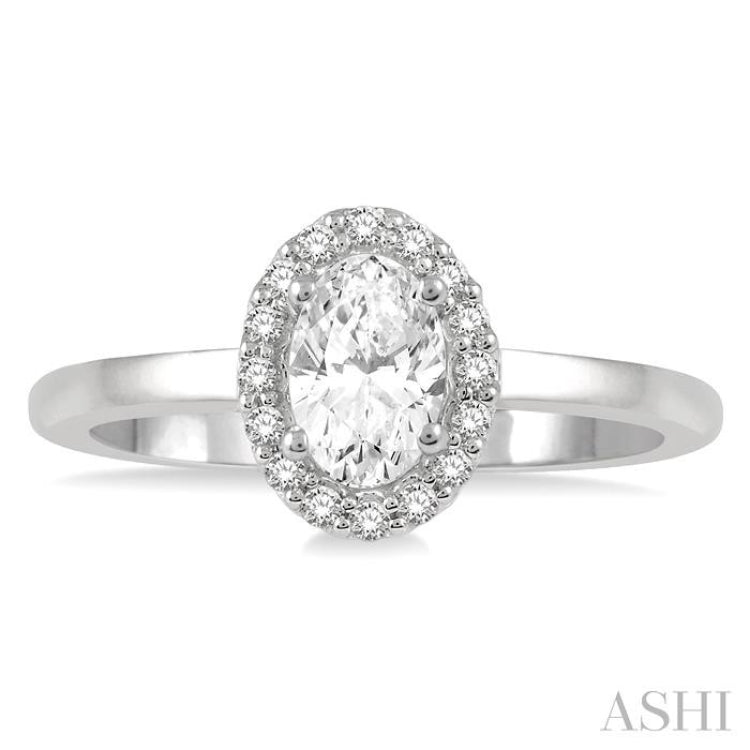 1/3 ctw Round Cut Diamond Halo Engagement Ring With 1/4 ctw Oval Cut Center Stone in 14K White Gold