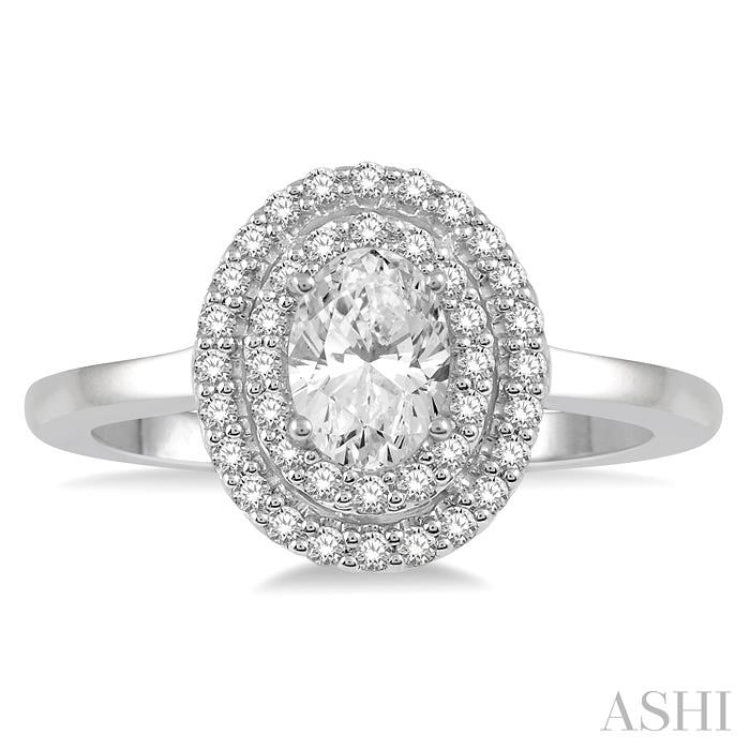 1/2 ctw Oval Cut Center Stone and Round Cut Diamond 1/3 ctw Ladies Engagement Ring in 14K White Gold