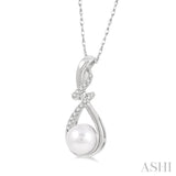 1/10 ctw Round Cut Diamond & 7MM Round Pearl Pendant With Chain in 10K White Gold