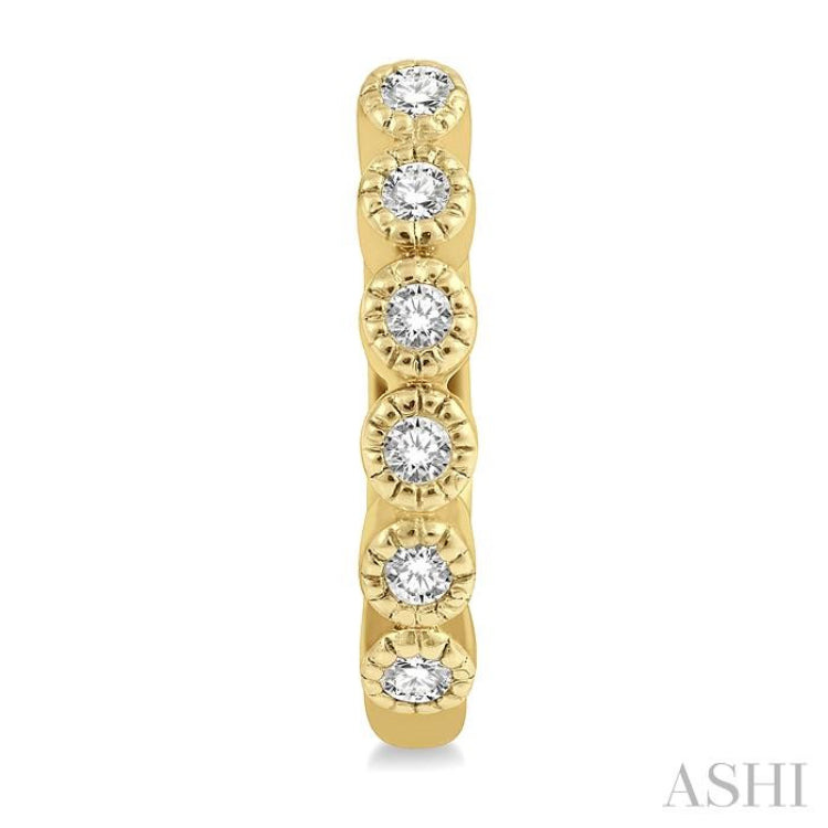 1/10 ctw Round Cut Diamond Huggie Earrings in 10K Yellow Gold