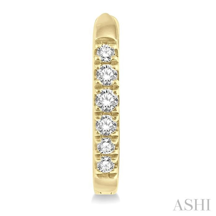 1/8 ctw Round Cut Diamond Huggie Earrings in 10K Yellow Gold