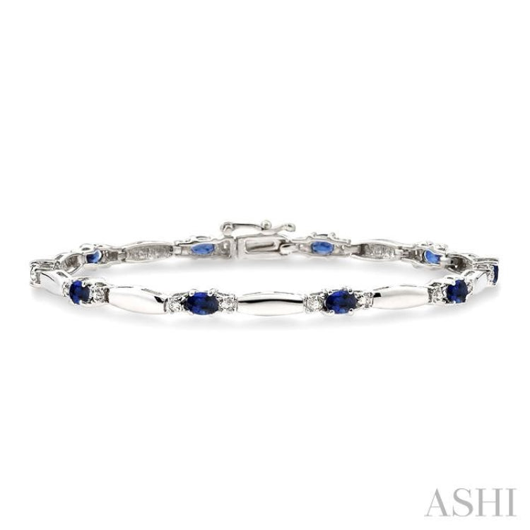 1/10 ctw Bar and Oval Mount Round Cut Diamond & 5x3MM Oval Cut Sapphire Precious Bracelet in 10K White Gold