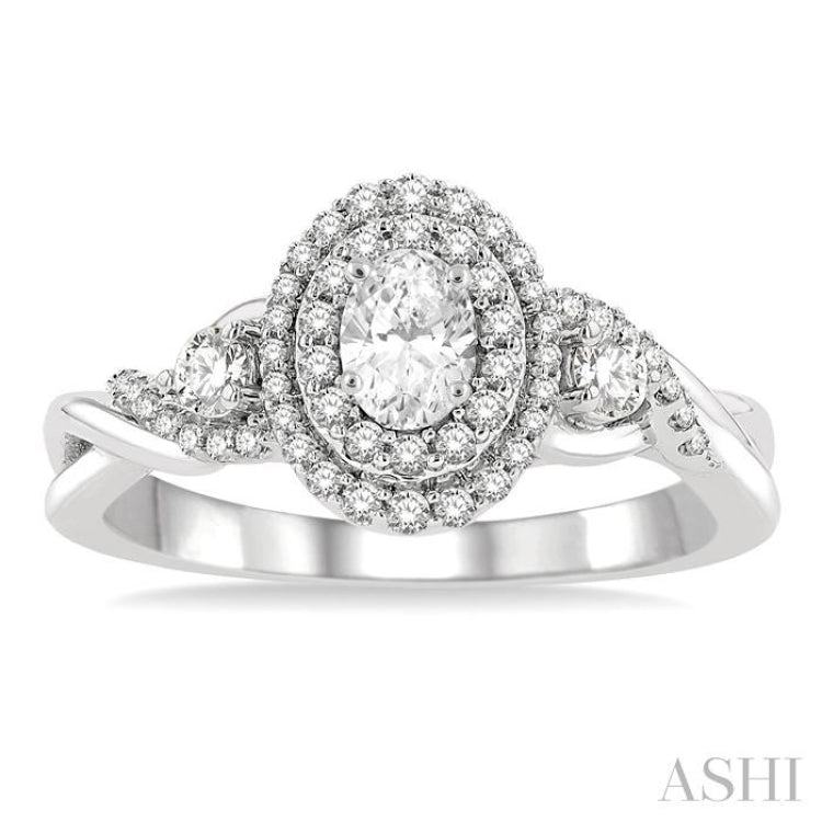 5/8 ctw Split Twisted Shank Round Cut Diamond Engagement Ring With 1/4 ctw Oval Cut Center Stone in 14K White Gold