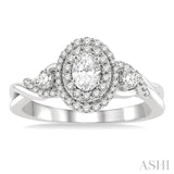 5/8 ctw Split Twisted Shank Round Cut Diamond Engagement Ring With 1/4 ctw Oval Cut Center Stone in 14K White Gold