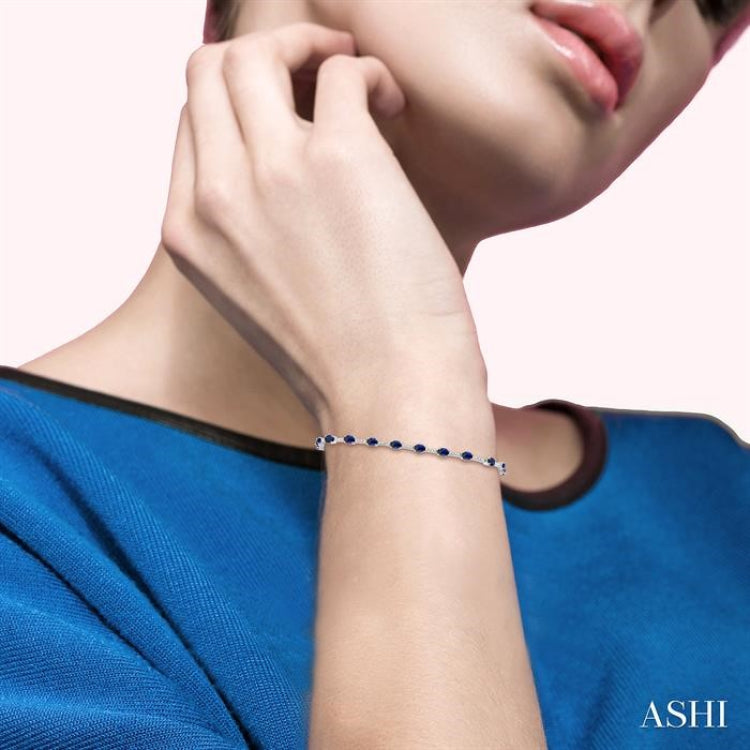 1/3 ctw Round Cut Diamond & 4x3MM Oval Cut Sapphire Precious Bracelet in 10K White Gold
