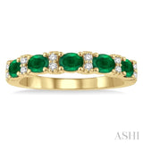 1/6 ctw Oval Shape 4x3MM Emerald and Round Cut Diamond Precious Band in 14K Yellow Gold