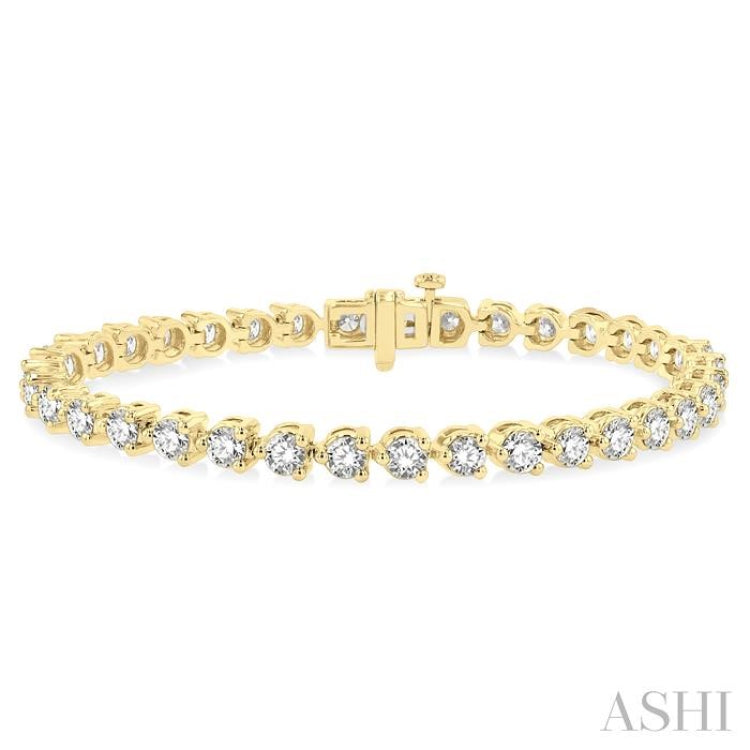 7 ctw Tri-Prong Round Cut Diamond Tennis Bracelet in 14K Yellow Gold