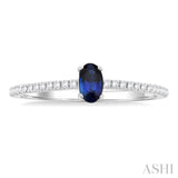 5x3 MM Oval Cut Sapphire and 1/10 Ctw Petite Round Cut Diamond Precious Fashion Ring in 10K White Gold