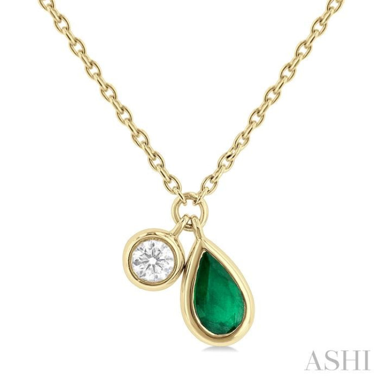 5x3 MM Pear Cut Emerald and 1/50 ctw Bezel Set Round Cut Diamond Precious Pendant With Chain in 10K Yellow Gold