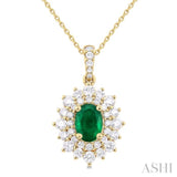 7x5 MM Oval Cut Emerald and 3/4 ctw Round Cut Diamond Precious Pendant With Chain in 14K Yellow Gold