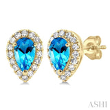 5x3 MM Pear Shape Blue Topaz and 1/8 ctw Single Cut Diamond Halo Semi Precious Stud Earrings in 14K Yellow Gold