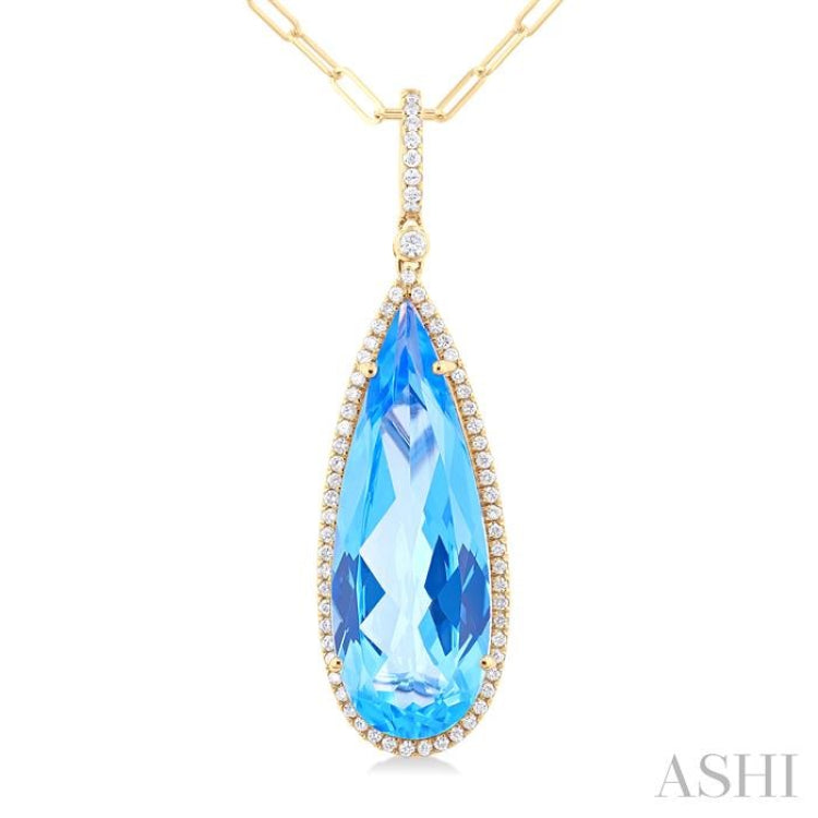 26x9 MM Pear Cut Blue Topaz and 1/4 ctw Round Cut Diamond Halo Semi Precious Pendant With Chain in 14K Yellow Gold