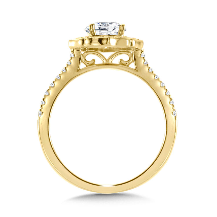 An art deco diamond halo frames the classic round center stone, resting above a sleek 1/2 diamond shank.