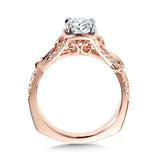 Diamond engagement ring mounting with side stones set in 14k rose gold.