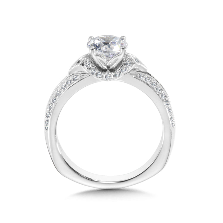 Diamond engagement ring mounting with side stones set in 14k white gold.