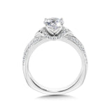 Diamond engagement ring mounting with side stones set in 14k white gold.