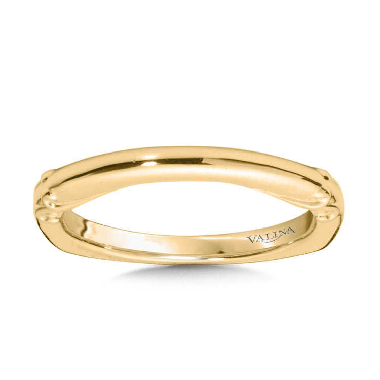 This true fit matching wedding band is adorned with delicate filigree swirls, adding depth to this purely golden design.