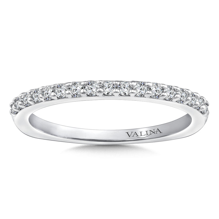 True fit matching diamond wedding band and a beautiful reminder of that special day for years to come.
